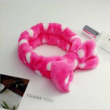 Косметическая повязка на голову с бантиком малиновая в белый горошек